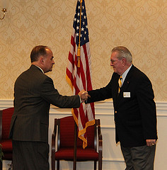 Compatriot John Terry being inducted by President Bill Price